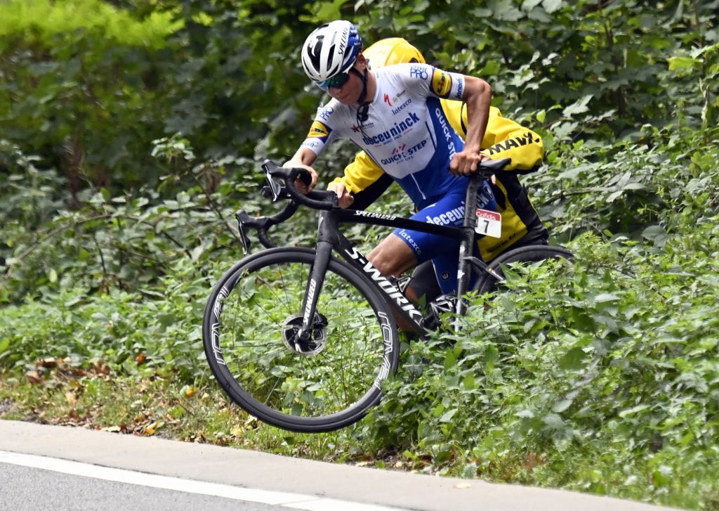 Belgian rider Mauri Vansevenant of Deceuninck QuickStep recovers after crashing during the 84th edition of the mens one day cycling race race La Fleche Wallonne Waalse Pijl Walloon Arrow 220kms from Ans to Huy on September 30 2020 Switzerlands Marc Hirschi of Team Sunweb was the victor as the 2020 edition was postponed from April to September due to the ongoing Coronavirus Covid19 pandemic Photo by ERIC LALMAND BELGA AFP Belgium OUT Photo by ERIC LALMANDBELGAAFP via Getty Images