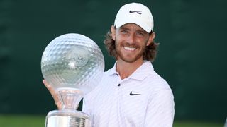 Tommy Fleetwood with the trophy after winning the Nedbank Golf Challenge
