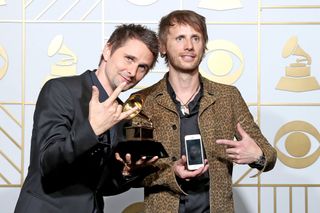 Muse's Matt Bellamy and Dom Howard with their Grammy
