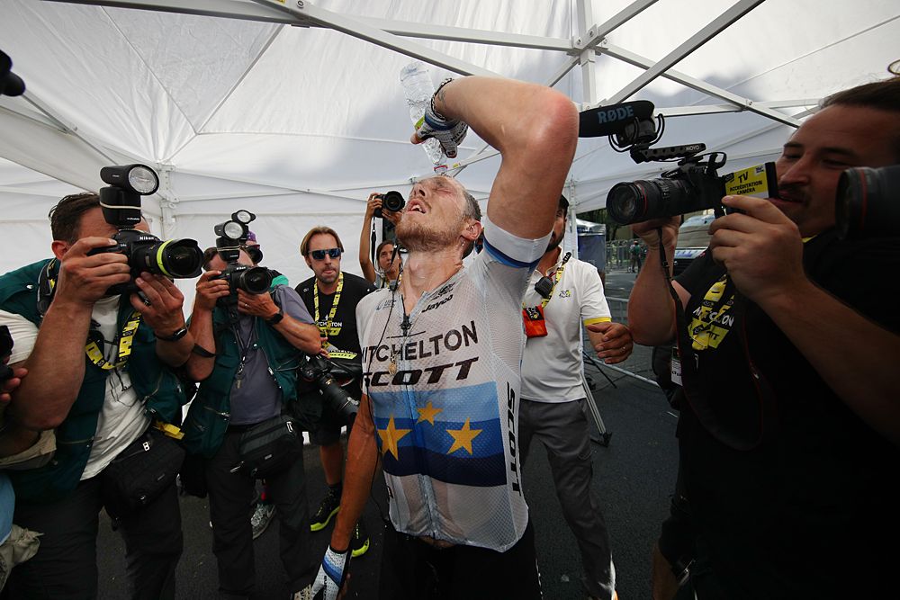 Matteo Trentin (Mitchelton-Scott) celebrates a solo victory on stage 17 at the Tour de France