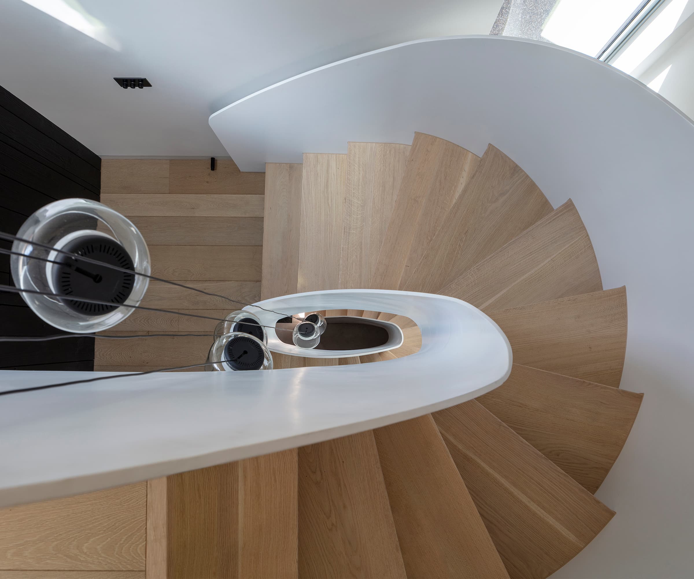 An aerial shot of a three-storey spiral staircase