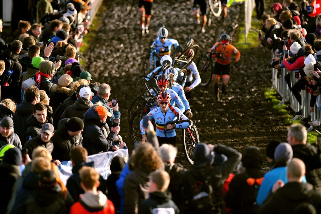 COL DU VAM DRENTHE NETHERLANDS NOVEMBER 07 A general view of Michael Vanthourenhout of Belgium and riders compete while fans cheer during the 19th UEC European Cyclocross Championships 2021 Mens Elite EuroCross21 UECcycling on November 07 2021 in Col du Vam Drenthe Netherlands Photo by Luc ClaessenGetty Images