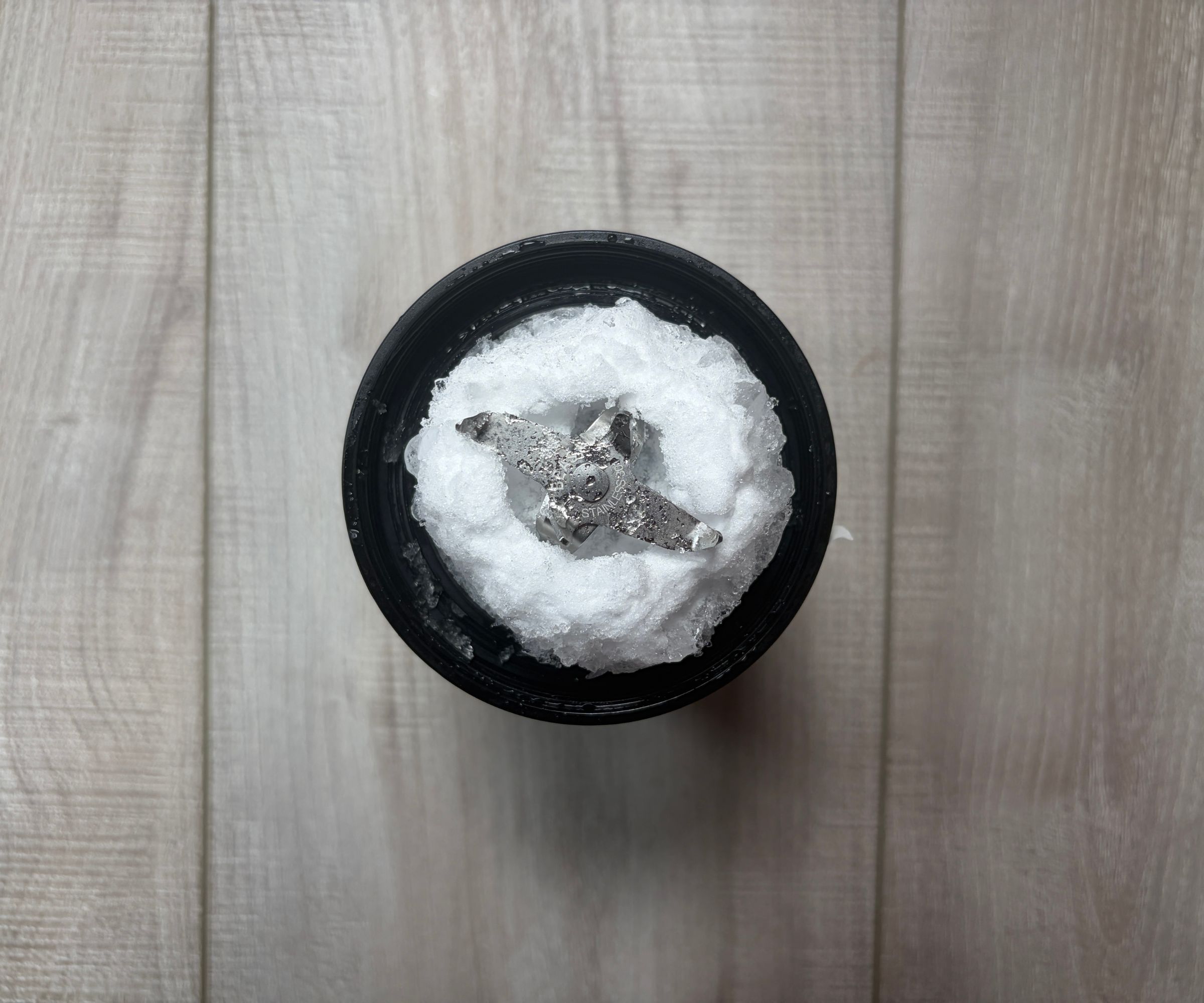 Ice compacted around the blades of a small blender