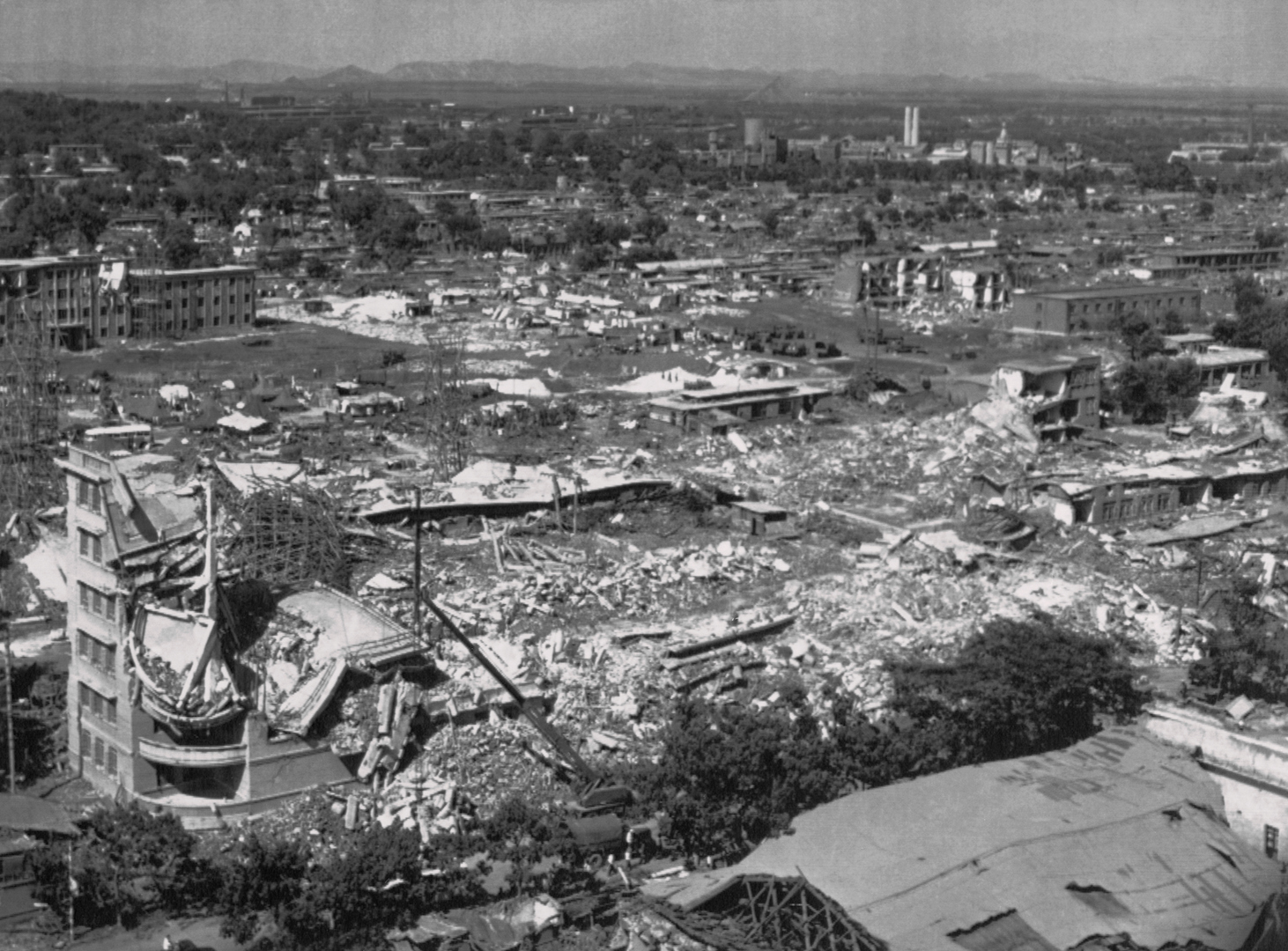 View of the damage in Tangshan, China after the magnitude 7.8 earthquake in 1976.