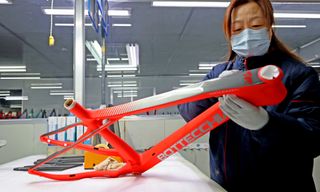 LIANYUNGANG CHINA DECEMBER 21 A worker manufactures carbon fiber bicycles for export at ZGL Shenying composite material company on December 21 2022 in Lianyungang Jiangsu Province of China Photo by VCGVCG via Getty Images