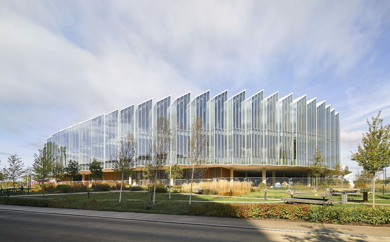 exterior of AstraZeneca&#039;s Discovery Centre by Herzog de Meuron photographed from a distance in the daylight