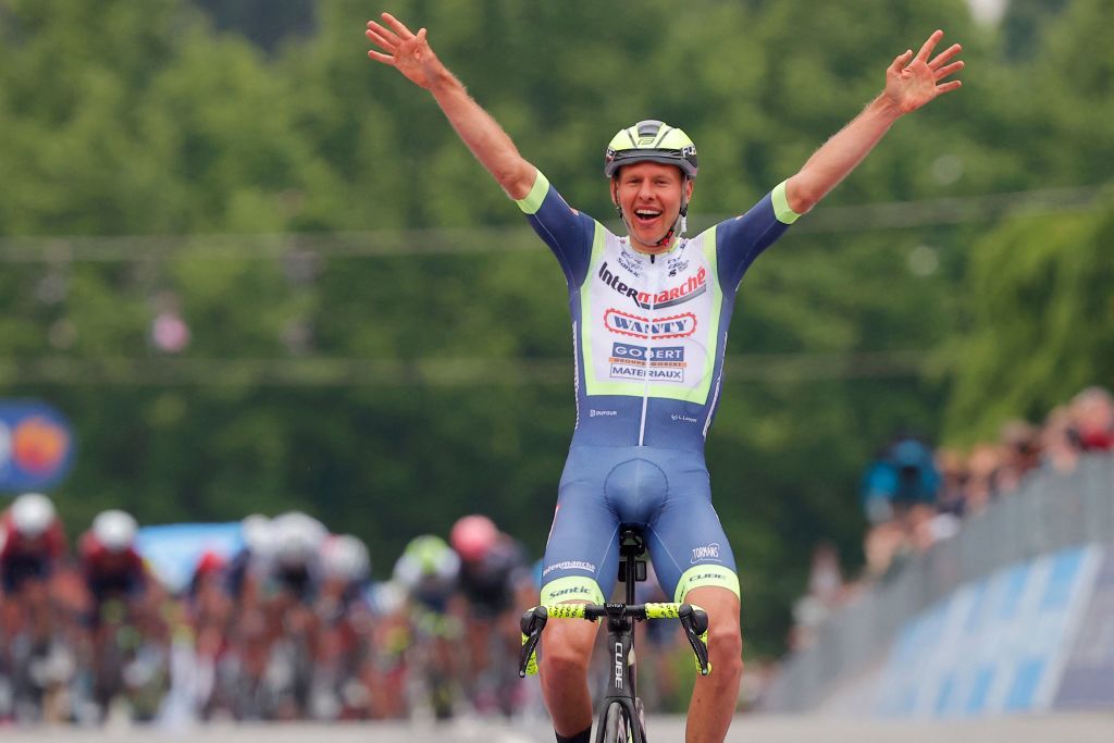Team Wanty rider Netherlands Taco Van der Hoorn reacts as he crosses the finish line to win the third stage of the Giro dItalia 2021 cycling race 190 km between Biella and Canale Piedmont on May 10 2021 Photo by Luca Bettini AFP Photo by LUCA BETTINIAFP via Getty Images