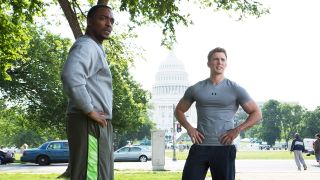 Sam Wilson and Steve Rogers standing with their hands on their hips in Captain America: The Winter Soldier