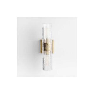 bathroom wall sconce in brass and fluted glass