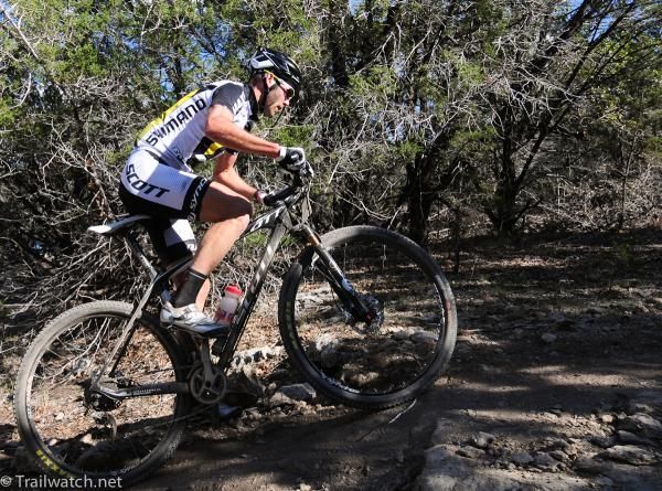 Geoff Kabush (3Rox Racing) about 5 seconds behind Max Plaxton on lap four