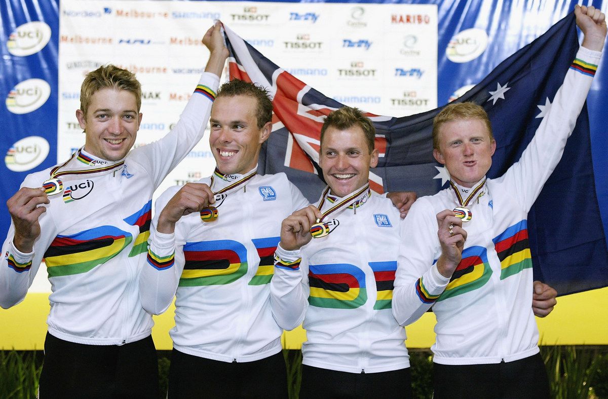 Stephen Wooldridge, second from left, in his rainbow jersey after Australian won the team pursuit at the 2004 Track Worlds