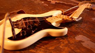 Smashed guitar on stage