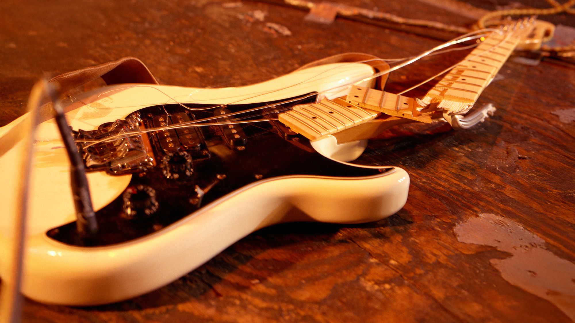 Smashed guitar on stage