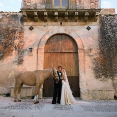 An image of karoline and max posing with a horse.