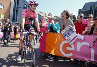 Dutch Tom Dumoulin of Team Giant Alpecin is congratulated by supporters before the start of the second stage of the Giro dItalia in Arnhem on May 7 2016 AFP luk benies Photo credit should read LUK BENIESAFP via Getty Images