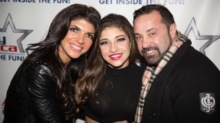 Teresa, Gia, and Joe Giudice smiling in 2014