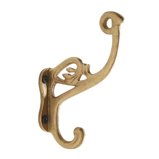 A gold decorative hook