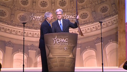 Mitch McConnell wins CPAC 2014 by strolling on stage with a gun