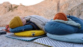 Couple sleeping on the Therm-a-Rest NeoAir XLite NXT