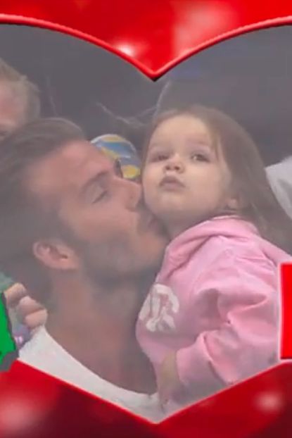 David Beckham kisses Harper on the KissCam