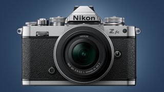 The Nikon Zfc camera on a blue background