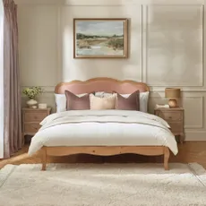 Bed with pink headboard
