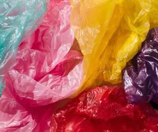 brightly colored plastic bags in a pile