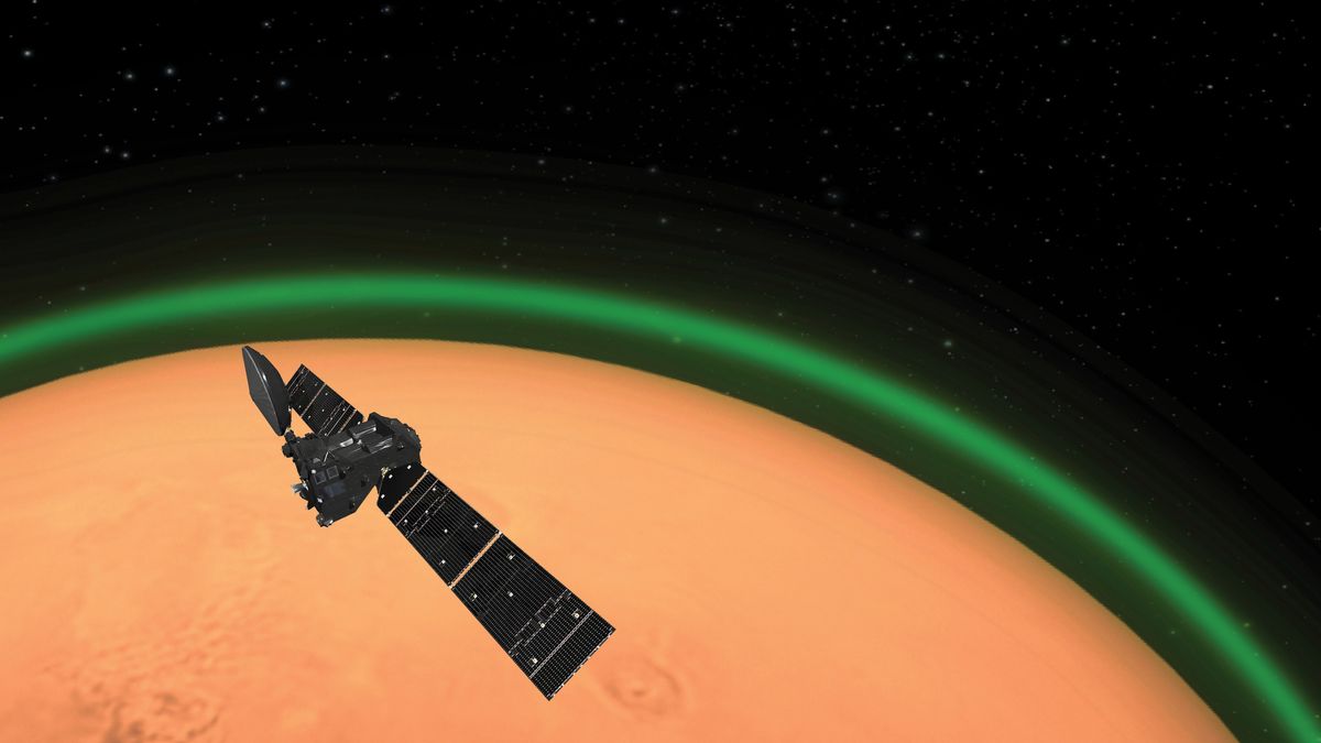 Artist&#039;s illustration of the European Space Agency&#039;s ExoMars Trace Gas Orbiter detecting the green glow of oxygen in the Martian atmosphere. This emission, spotted on the dayside of Mars, is similar to the night glow seen around Earth’s atmosphere from space.