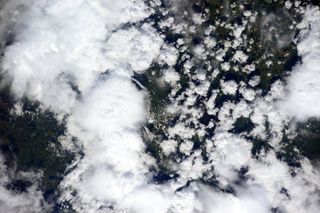 Expedition 42 Measuring Clouds and Aerosols From the Space Station