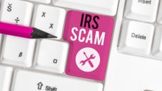 "IRS" scam written on a keyboard