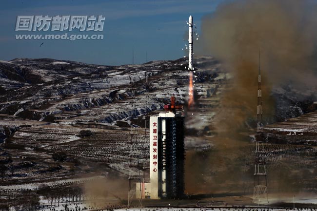 A Chinese Long March 4B rocket lifts off from Taiyuan launching base in Shanxi province on Dec. 22, 2011 to launch a new Earth-mapping satellite. 