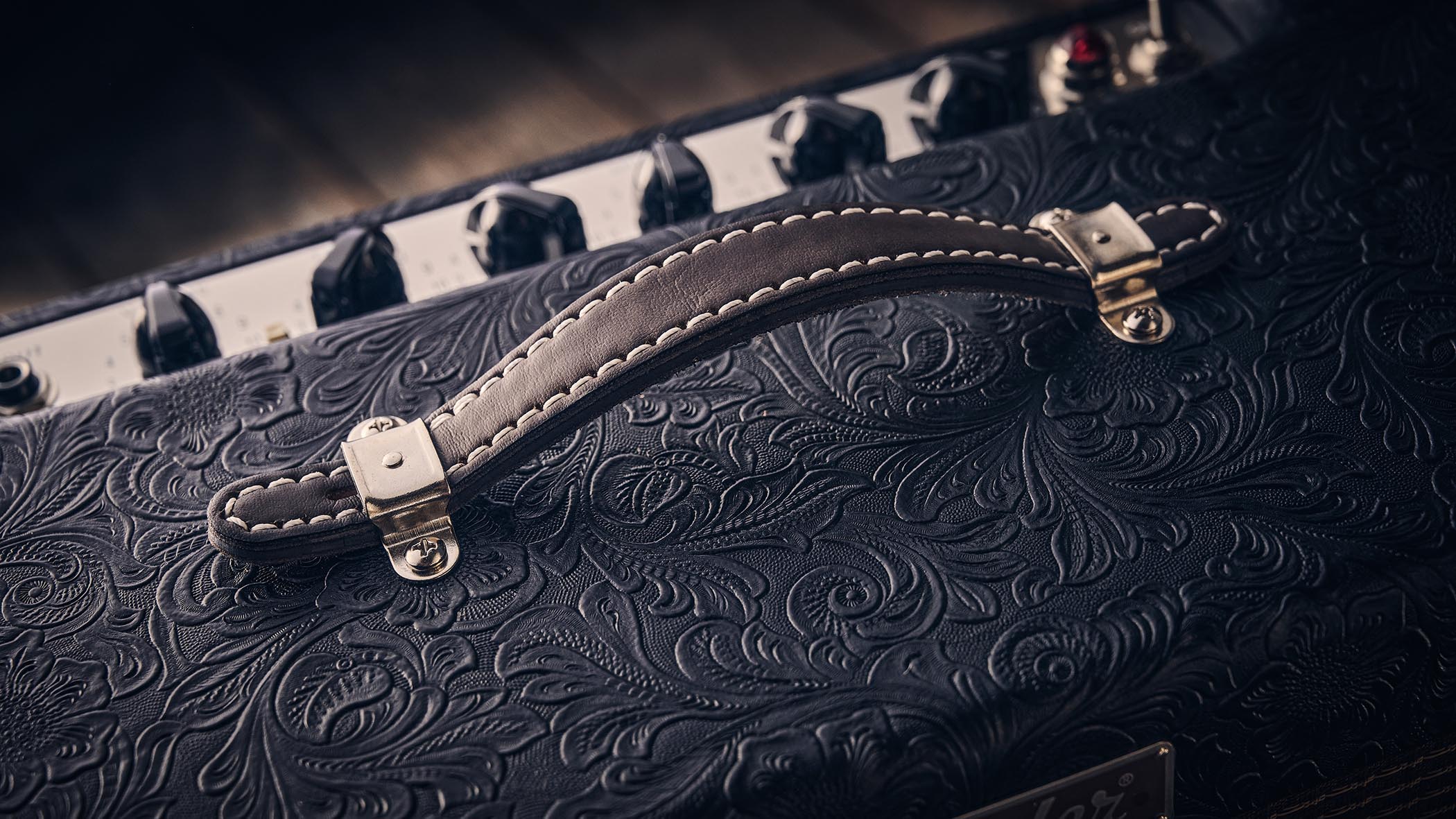 Fender Blues Junior IV 30th Anniversary: the classic combo is refinished with a touch of cowboy western flair, and is here photographed against some weathered floorboards in close-up