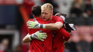 Arsenal goalkeepers David Raya and Aaron Ramsdale embrace ahead of the Premier League game against Bournemouth in September 2023.