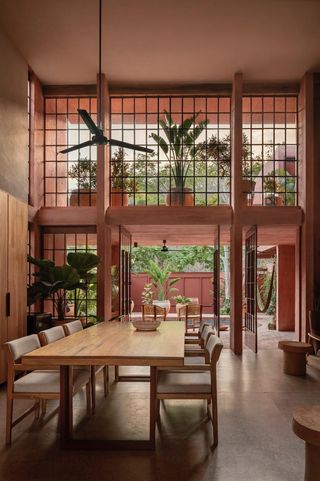 casa roja, a red house by angel garcia in mexico with indoor outdoor areas and terraces anda brutalist exposed concrete in red tone