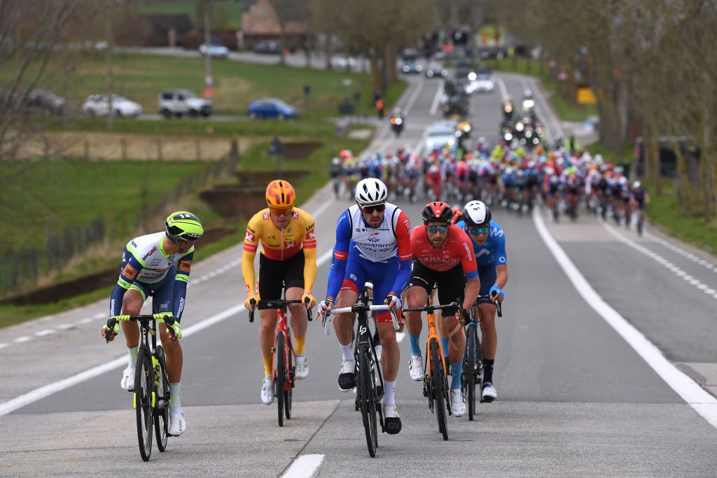 HARELBEKE BELGIUM MARCH 26 Rasmus Fossum Tiller of Norway and UNO X Pro Cycling Team Lluis Mas Bonet of Spain and Movistar Team Jonathan Milan of Italy and Team Bahrain Victorious Taco Van Der Hoorn of Netherlands and Team Intermarch Wanty Gobert Matriaux Alexys Brunel of France and Team Groupama FDJ Marco Haller of Austria and Team Bahrain Victorious during the 64th E3 Saxo Bank Classic 2021 a 2039km race from Harelbeke to Harelbeke Breakaway E3SaxobankClassic on March 26 2021 in Harelbeke Belgium Photo by Tim de WaeleGetty Images
