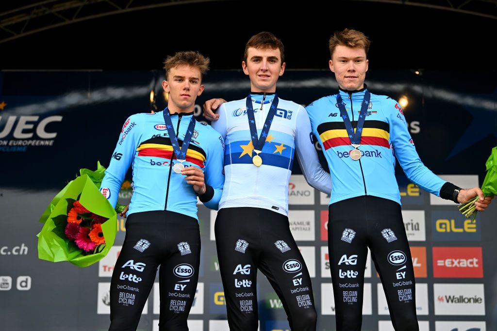 NAMUR BELGIUM NOVEMBER 05 LR Silver medalist Thibau Nys of Belgium gold medalist Emiel Verstrynge of Belgium and bronze medalist Witse Meeussen of Belgium pose on the podium during the medal ceremony after the 20th UEC European Cyclocross Championships 2022 Mens U23 EuroCross22 on November 05 2022 in Namur Belgium Photo by Luc ClaessenGetty Images
