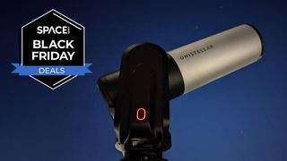 The Unistellar eVscope 2 with the blue night sky in the background and a black Space.com Black Friday deals badge in the upper-left corner.