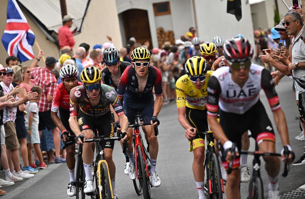 Team ArkeaSamsic teams Colombian rider Nairo Quintana L UAE Team Emirates teams Slovenian rider Tadej Pogacar wearing the overall leaders yellow jersey 2nd R and Ineos Grenadiers teams British rider Geraint Thomas C cycle in the ascent of the Cold du Granon Serre Chevalier during the 11th stage of the 109th edition of the Tour de France cycling race 1517 km between Albertville and Col du Granon Serre Chevalier in the French Alps on July 13 2022 Photo by Marco BERTORELLO AFP Photo by MARCO BERTORELLOAFP via Getty Images