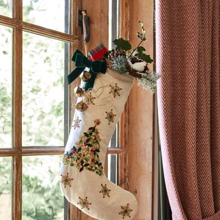 Dunelm christmas stocking hanging on window