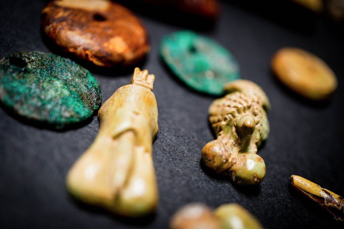 The collection included phallus-shaped amulets.