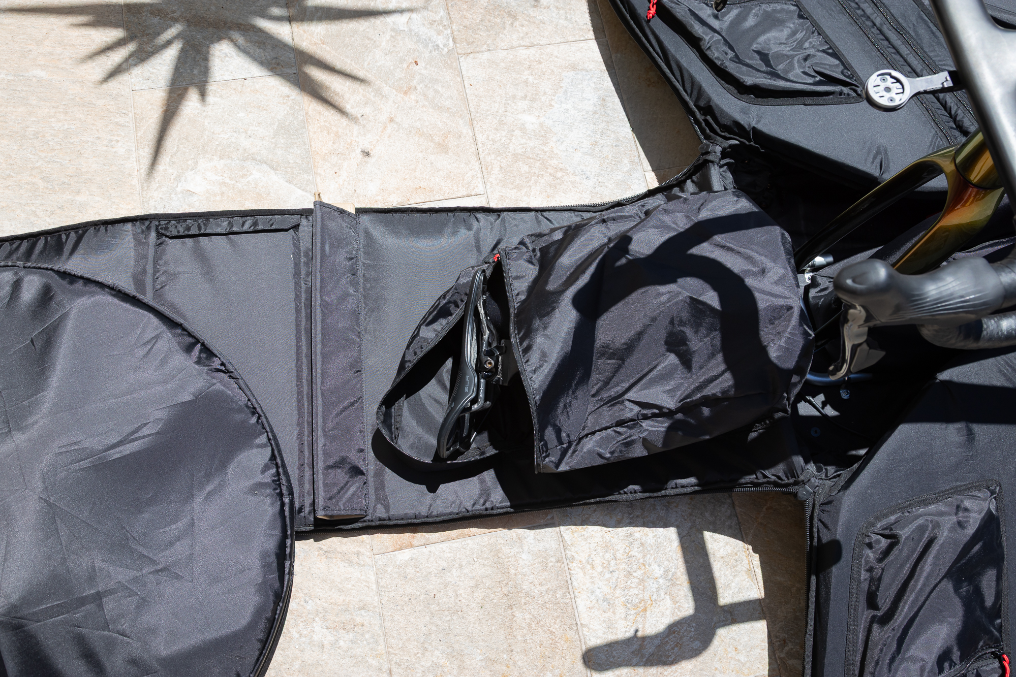 a saddle sitting inside a large pocket inside the box