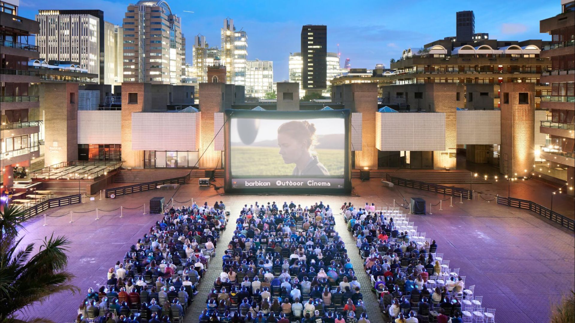 an image of the outdoor cinema with Arrival (2016) playing on the big screen