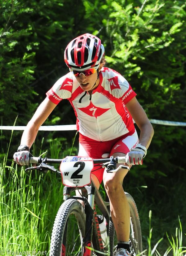 Lea Davison (Specialized) climbs up one of the ski runs with the lead