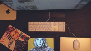 Desk with a Wacom tablet, Mac, copy of Vogue magazine