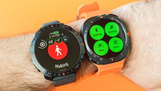 Polar Grit X2 Pro and Samsung Galaxy Watch Ultra close-up photo on a user's wrist against a bright orange background