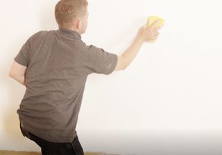 diy cleaning wall with sponge
