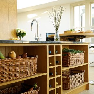 kitchen with open storage and wicker baskets