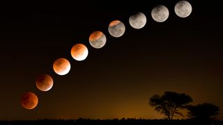 phases of a total lunar eclipse above the countryside