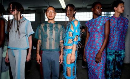 Eckhaus Latta S/S 2019 models dressed in cut out dresses and colourful patterned tops