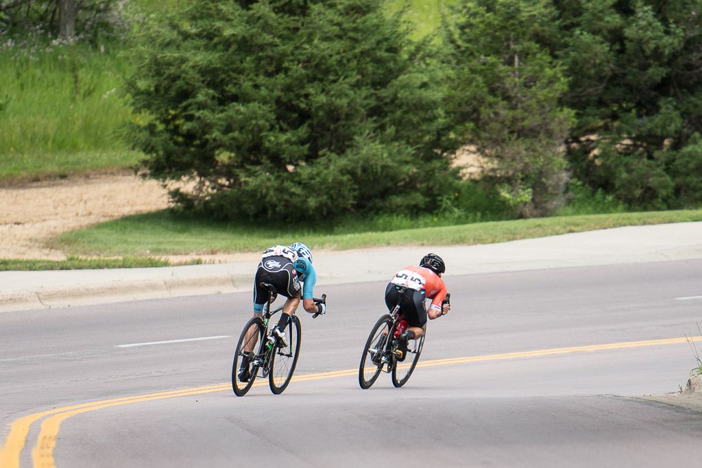 Evan Huffman (Rally Cycling) and Joseph Schmalz (Elevate Pro Cycling p/b Bicycle World) descend the long sweeping downhill on the finish circuit.